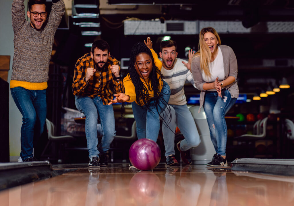 Truck driving company holds a bowling fundraiser to raise money for charity.